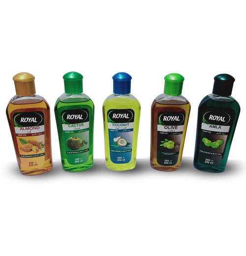 Four bottles of Hair Oil with different flavors by Royal Exports